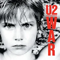 U2 — Seconds (Remastered 2008) — обложка